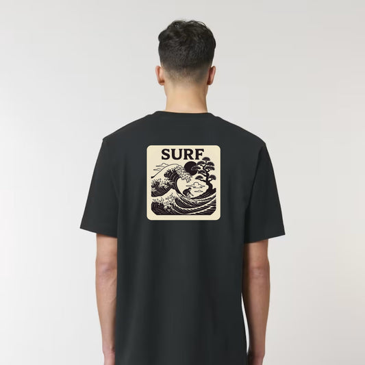 Person wearing a black t-shirt with a 'SURF' design on the back against a white background