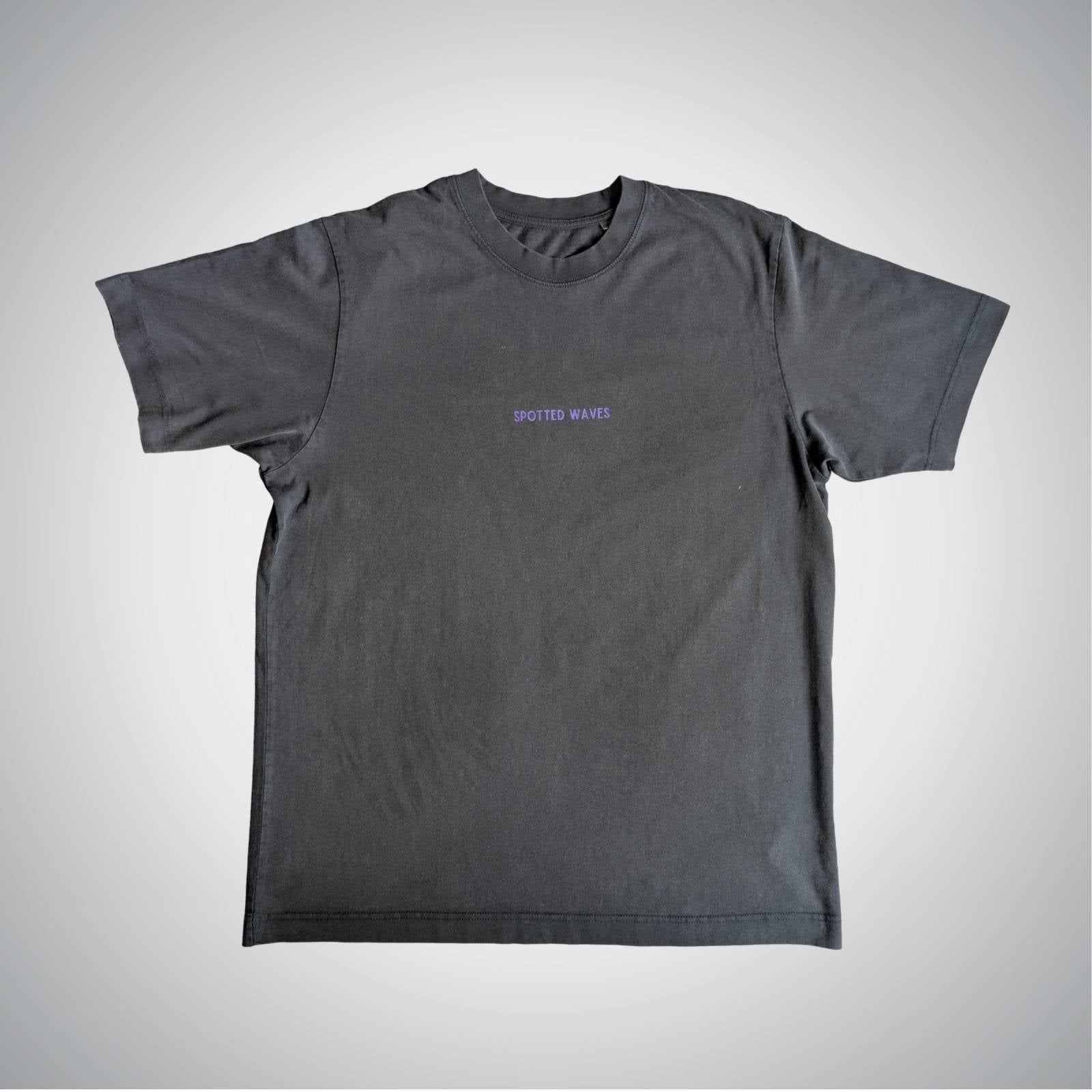 Gray t-shirt with a small logo on a light gray background