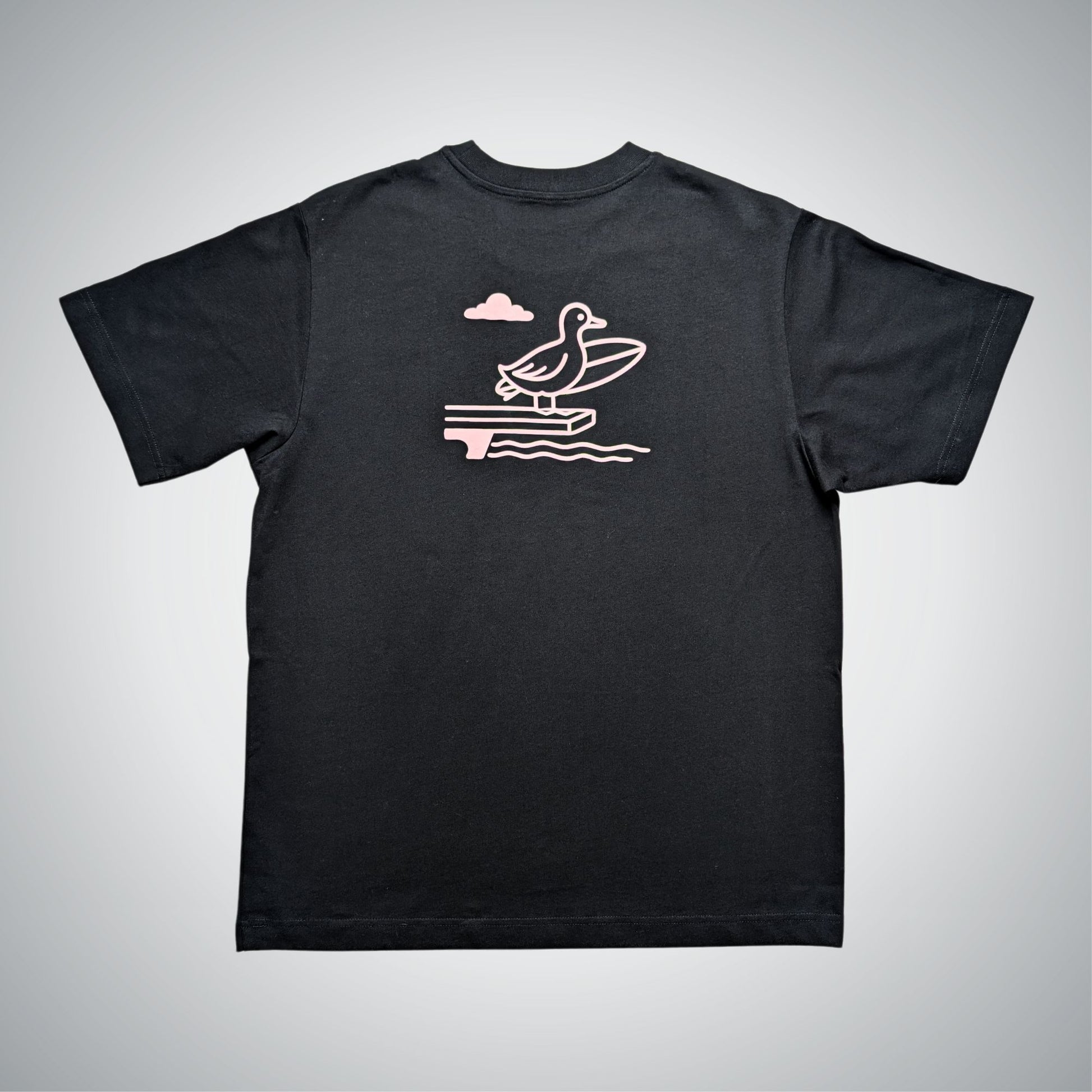 Black t-shirt with a pink graphic of a duck on a jumping board