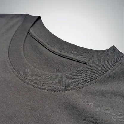 Close-up of a black collar on a light gray background